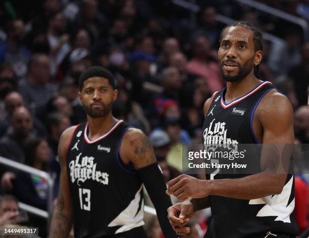 Kawhi Leonard of the LA Clippers reacts after a Minnesota Timberwolves foul in front of Paul George during a 99-88 win at Crypto.com Arena on...