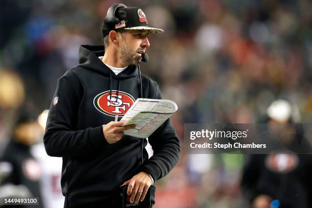 Head coach Kyle Shanahan of the San Francisco 49ers looks on against the Seattle Seahawks during the second quarter at Lumen Field on December 15,...
