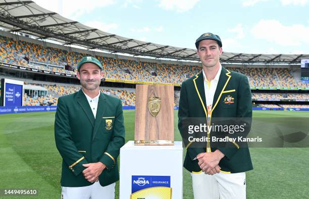 Test Captains Pat Cummins of Australia and Dean Elgar of South Africa pose for a photo during an Australian Test squad training session at The Gabba...