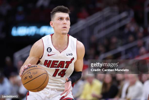 Tyler Herro of the Miami Heat controls the ball during the second half against the Houston Rockets at Toyota Center on December 15, 2022 in Houston,...