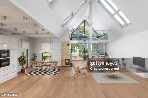 modern villa interior with living room, open plan kitchen and garden view through the window - split level home exterior stock pictures, royalty-free photos & images