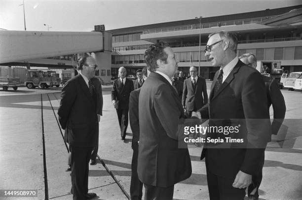 Portuguese Prime Minister Soares is shown off at Schiphol Airport by Foreign Minister Van der Stoel, March 10, 1977.