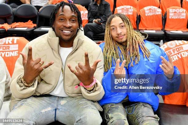 Alshon Jeffery and Aviator Keyyz attend a basketball game between the Los Angeles Clippers and the Phoenix Suns at Crypto.com Arena on December 15,...