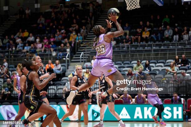 Tiffany Mitchell of the Boomers lays up the ball during the round six WNBL match between Sydney Flames and Melbourne Boomers at Quay Centre, on...