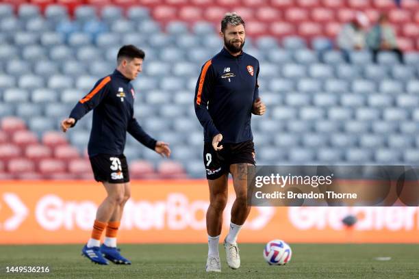 Charlie Austin of the Roar warms up prior to the round eight A-League Men's match between Newcastle Jets and Brisbane Roar at McDonald Jones Stadium,...