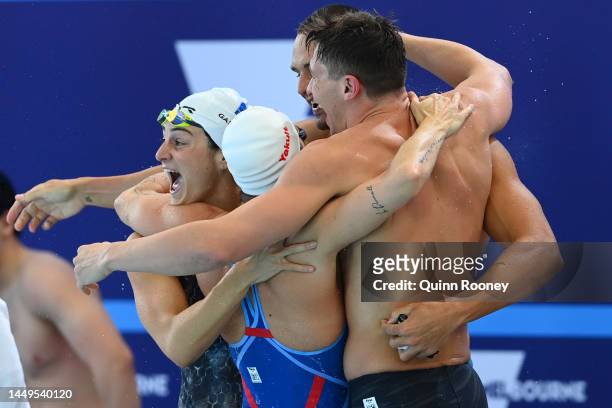 Maxime Grousset, Florent Manaudou, Beryl Gastaldello and Melanie Henique of France celebrate winning gold in the Mixed 4x50m Freestyle Final, in a...