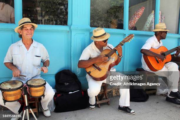 Cuban salsa band performs on a street in downtown Havana on July 9, 2017.