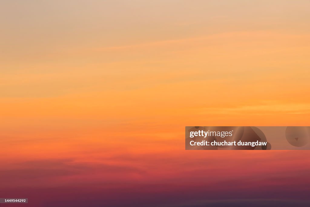 Beauty sky of pink with orange and yellow and violet clouds at sunset springtime