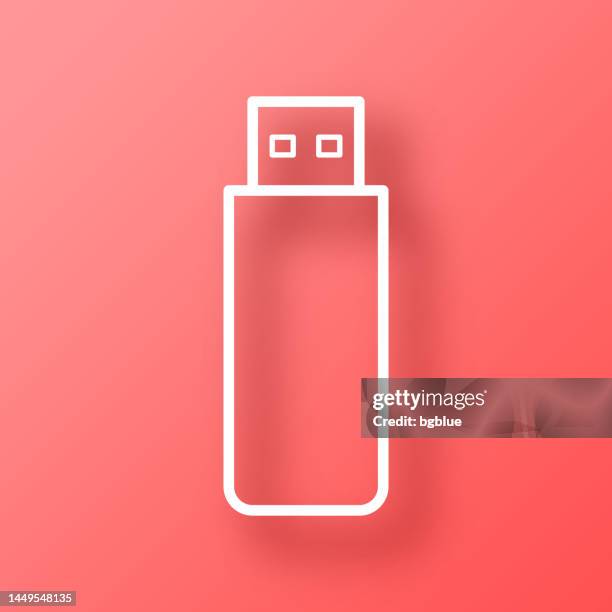 usb flash drive. icon on red background with shadow - usb stick stock illustrations