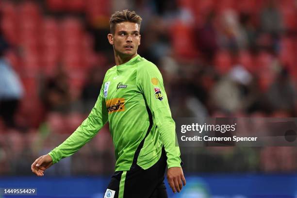 Chris Green of the Thunder looks on during the Men's Big Bash League match between the Sydney Thunder and the Adelaide Strikers at Sydney Showground...