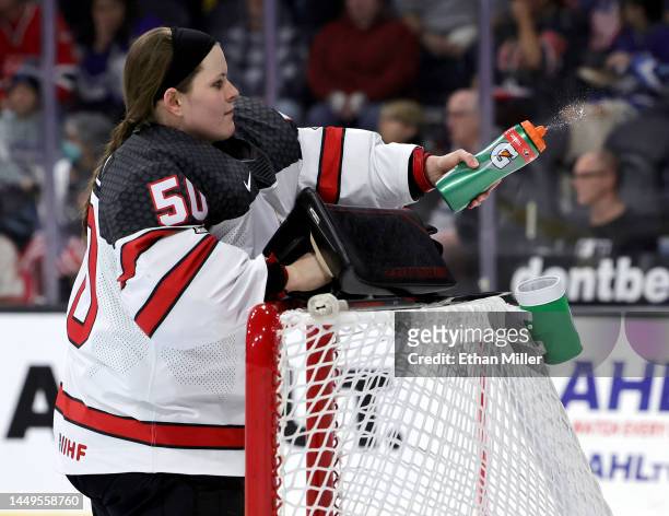 Kristen Campbell of Team Canada squeezes a water bottle before a Rivalry Series game against Team United States at The Dollar Loan Center on December...