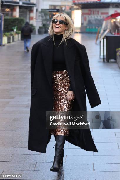 Ashley Roberts leaving Heart Breakfast Radio Studios on her last show before Christmas on December 16, 2022 in London, England.