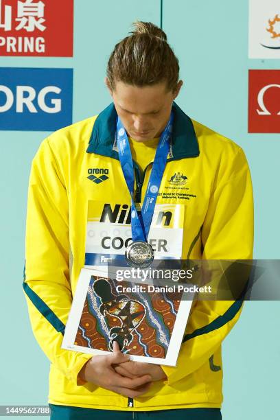 Silver medallist Isaac Cooper of Australia poses during the medal ceremony for the Men’s 50m Backstroke Final on day four of the 2022 FINA World...