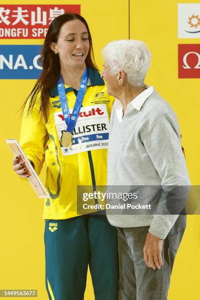 Gold medallist Lani Pallister of Australia is congratulated by former Australian swimmer Dawn Fraser during the medal ceremony for the Women's 1500m...