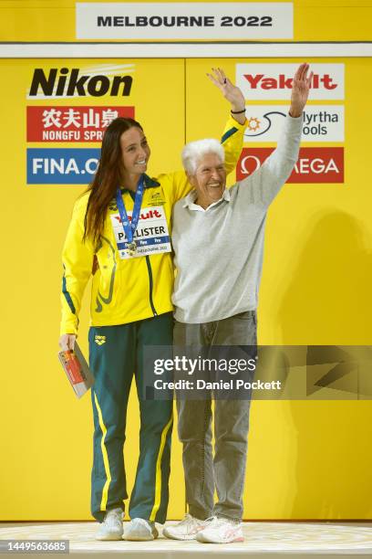 Gold medallist Lani Pallister of Australia is congratulated by former Australian swimmer Dawn Fraser during the medal ceremony for the Women's 1500m...