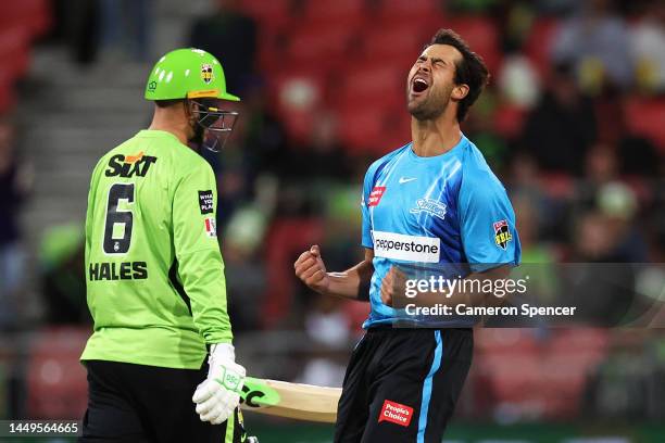 Wes Agar of the Strikers celebrates dismissing Alex Hales of the Thunder during the Men's Big Bash League match between the Sydney Thunder and the...