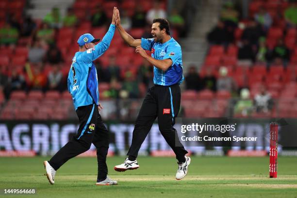 Wes Agar of the Strikers celebrates dismissing Alex Hales of the Thunder during the Men's Big Bash League match between the Sydney Thunder and the...