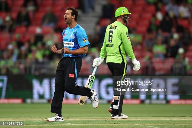 Wes Agar of the Strikers celebrates dismissing Alex Hales of the Thunder during the Men's Big Bash League match between the Sydney Thunder and the...