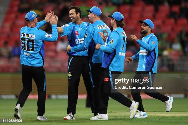 Wes Agar of the Strikers celebrates dismissing Chris Green of the Thunder during the Men's Big Bash League match between the Sydney Thunder and the...