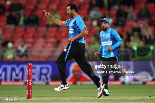 Wes Agar of the Strikers celebrates dismissing Gurinder Sandhu of the Thunder during the Men's Big Bash League match between the Sydney Thunder and...