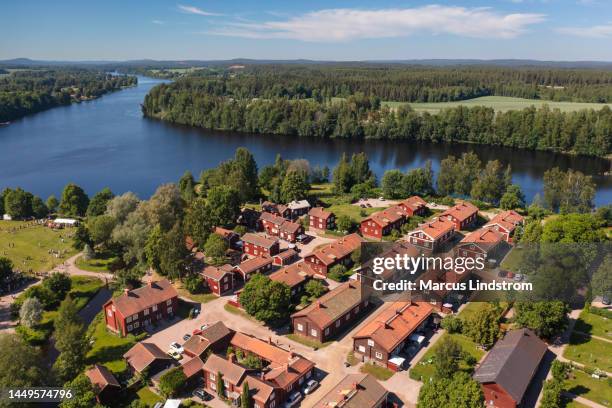 old houses by the dal river in avesta - dalarna stock pictures, royalty-free photos & images