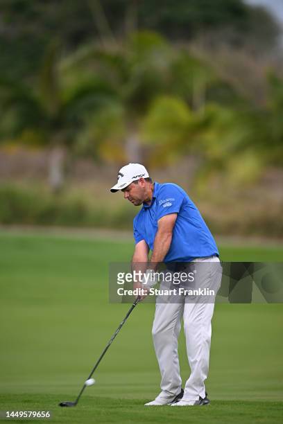 Jaco Van Zyl of South Africa plays his second shot on the 18th hole on Day One of the AfrAsia Bank Mauritius Open at Mont Choisy Le Golf on December...