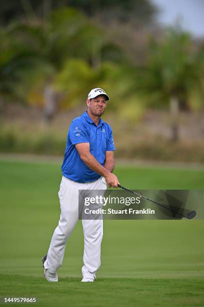 Jaco Van Zyl of South Africa plays his second shot on the 18th hole on Day One of the AfrAsia Bank Mauritius Open at Mont Choisy Le Golf on December...