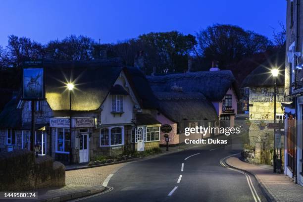 England, Isle of Wight, Shanklin Old Village, Thatched Buildings and Empty Road.