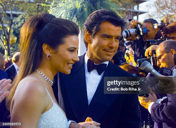 Journalist Keely Shaye Smith and actor Pierce Brosnan attend the 68th Academy Awards at the Dorothy Chandler Pavilion, March 25, 1996 in Los Angeles,...