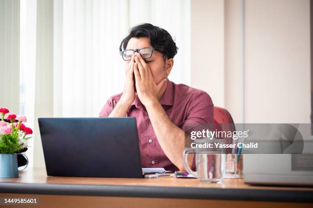 office worker working late and looking stress - emotional stress stock pictures, royalty-free photos & images