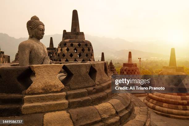 sunset, borobudur temple, indonesia - borobudur stock-fotos und bilder