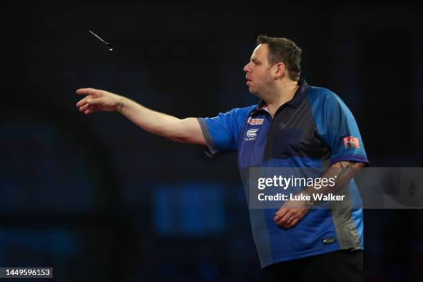 Adrian Lewis of England in action during his First Round match Daniel Larsson of Sweden against during Day Two of The Cazoo World Darts Championship...