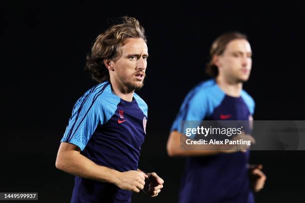 Luka Modric of Croatia looks on during the Croatia Training Session on match day -1 at on December 16, 2022 in Doha, Qatar.