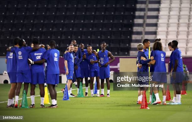 Players of France look on during the Training Session at Al Sadd SC on December 16, 2022 in Doha, Qatar.