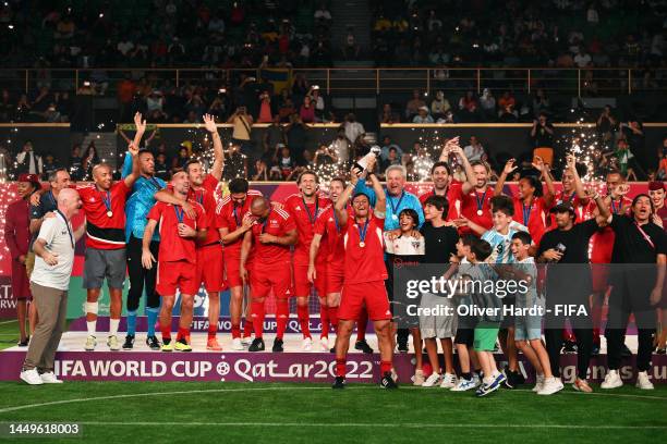 Javier Zanetti of South American Panthers lifts the trophy following victory in the final during day 2 of the FIFA Legends Cup at Khalifa...