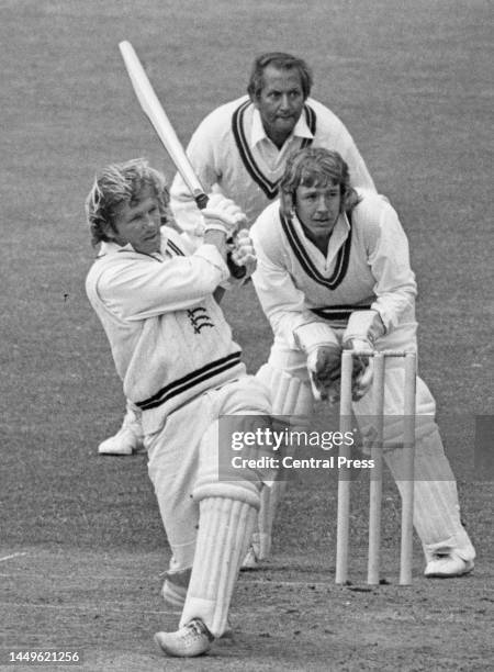 Wicketkeeper Gordon Wilcock and Basil D'Oliveira of Worcestershire County Cricket Club look on from behind the stumps as Middlesex County Cricket...