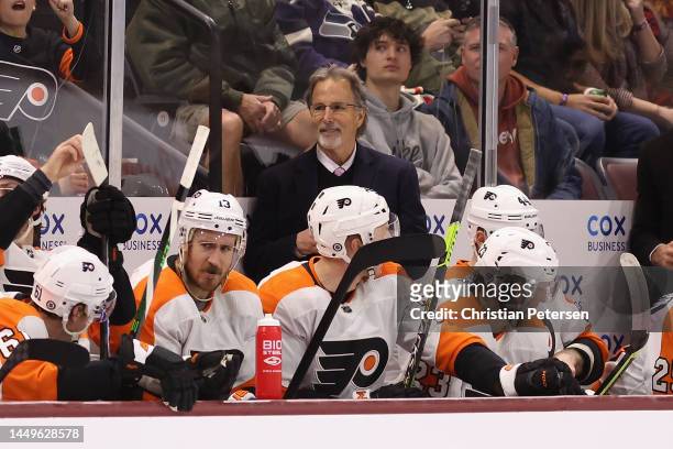 Head coach John tortorella of the Philadelphia Flyers watches from the bench during the second period of the NHL game at Mullett Arena on December...