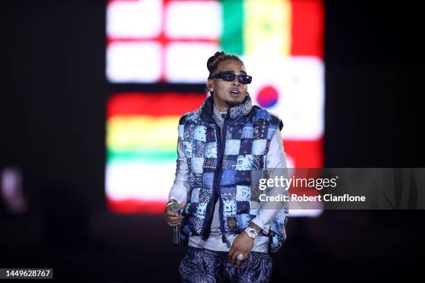 Ozuna performs during the Qatar Fashion United by CR Runway show at Stadium 974 on December 16, 2022 in Doha, Qatar.