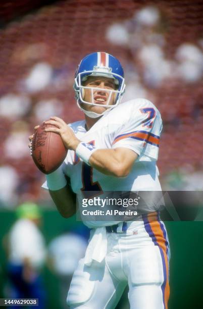 Quarterback John Elway of the Denver Broncos passes the ball in the game between the Denver Broncos vs the New York Jets at the Meadowlands on...