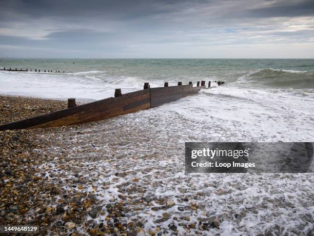 Groyne in the English Channel at East Selsey Beach.