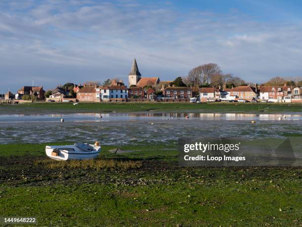 The village of Bosham beside Chichester Harbour at low tide.