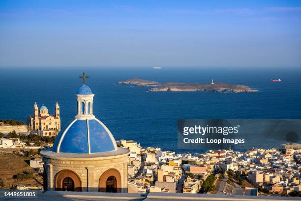 Dome of the church of Saint George with Syros harbour in view.