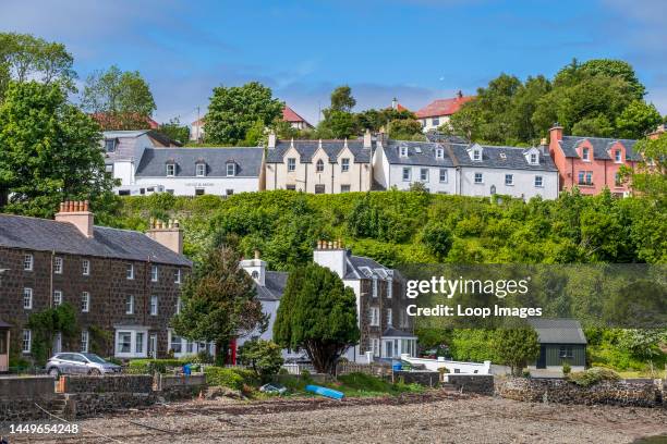 The beautiful harbour of Portree in Isle of Skye during summer.