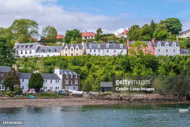 The beautiful harbour of Portree in Isle of Skye during summer.