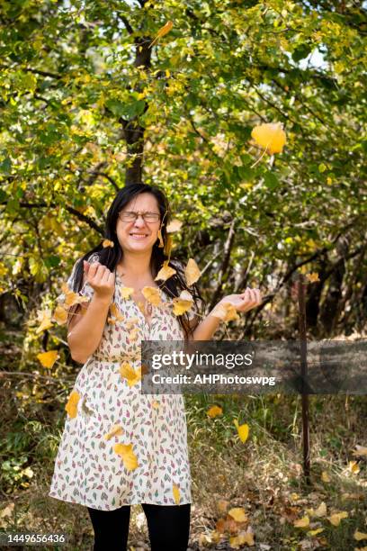 autumn woman 2 - métis stock pictures, royalty-free photos & images