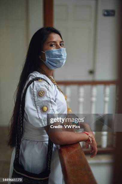 Portrait of young Arhuaco indigenous woman wearing a face mask during the Covid-19 outbreak in Colombia.