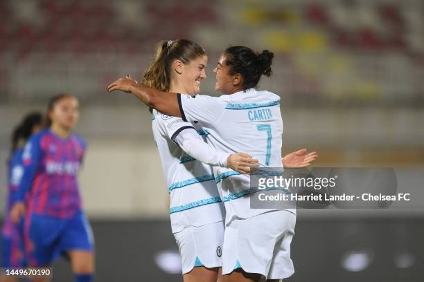 Maren Mjelde of Chelsea celebrates with teammate Jess Carter after scoring her team's fourth goal during the UEFA Women's Champions League group A...