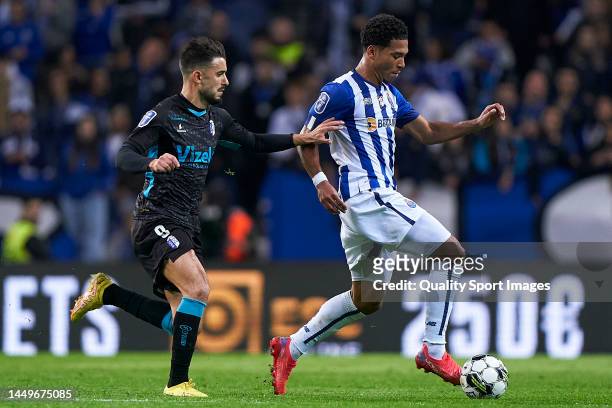 Raphael Guzzo of FC Vizela competes for the ball with Danny Namaso of FC Porto during the Taca da Liga - Allianz CUP match between FC Porto and FC...