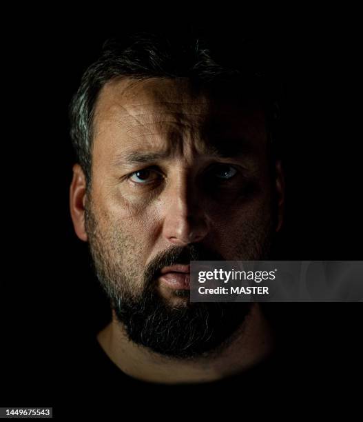 portrait of confident man on street at night - male silhouette stock pictures, royalty-free photos & images