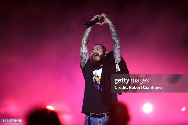 Post Malone performs during the Qatar Fashion United by CR Runway show at Stadium 974 on December 16, 2022 in Doha, Qatar.